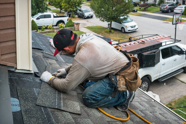 Professional Roof Replacement technician working in Garrattsville, NY